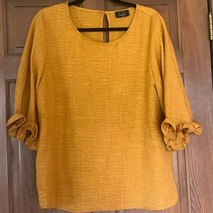 Mustard Ruffle Sleeve Top Brand New Size Large.